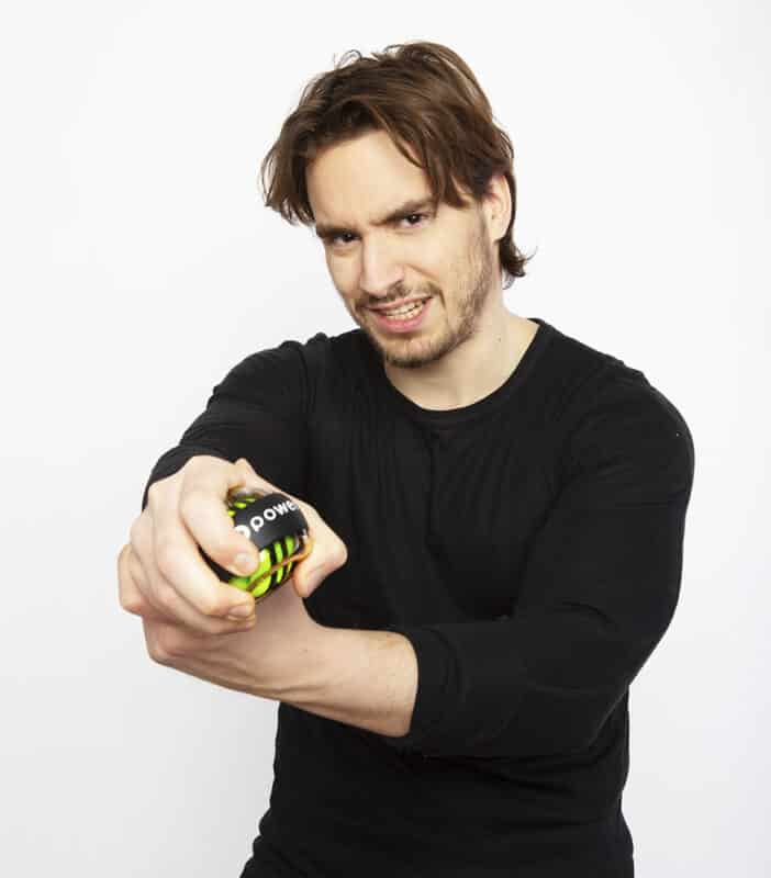 man with powerball exercising