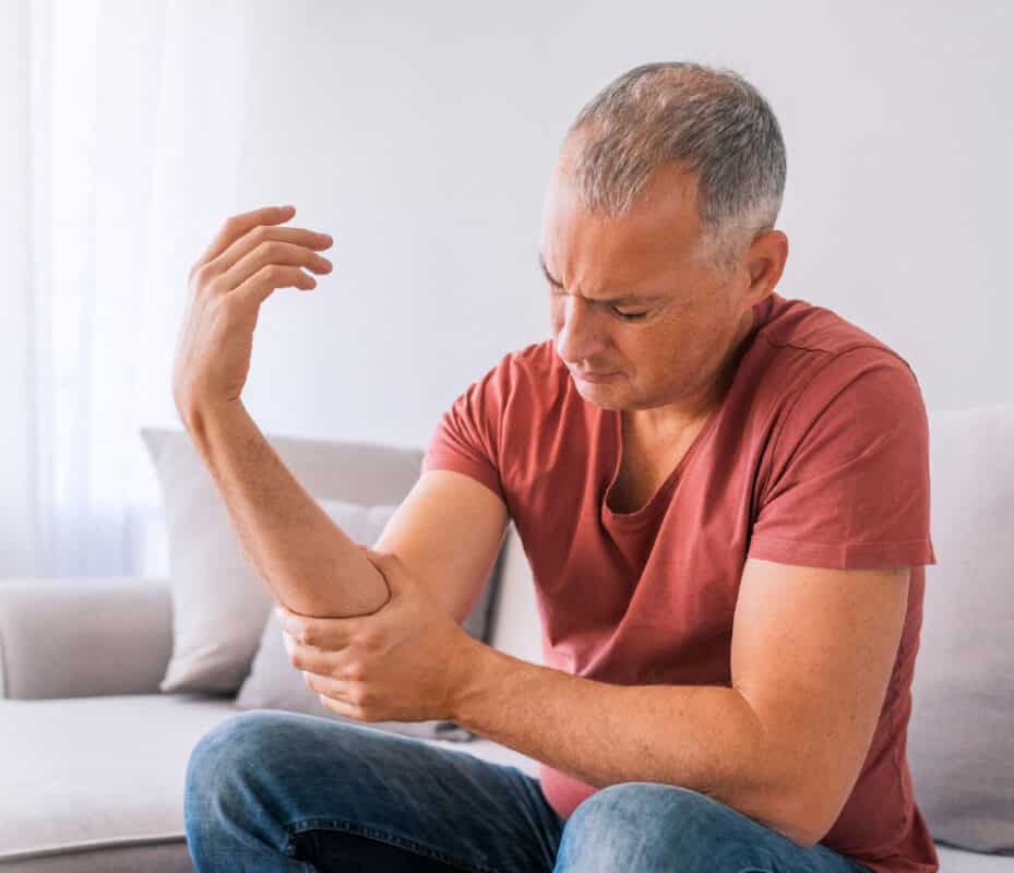 tennis elbow rehabilitation man in pain